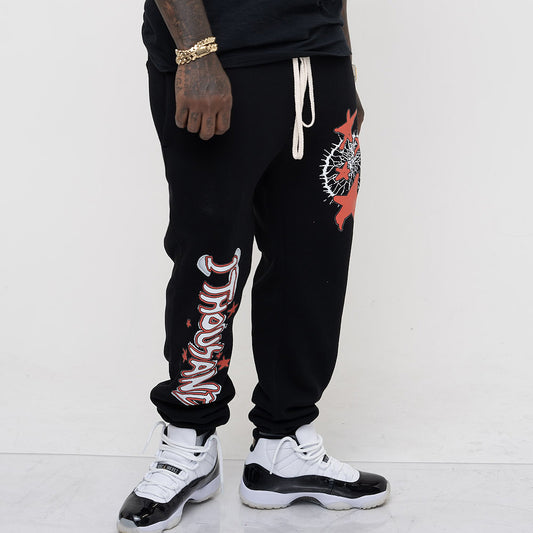 1 THOUSAND CLOTHING, HELL STAR TYPE, STREET WEAR UNISEX JOGGERS, BLACK FRONT CLOSE UP,
