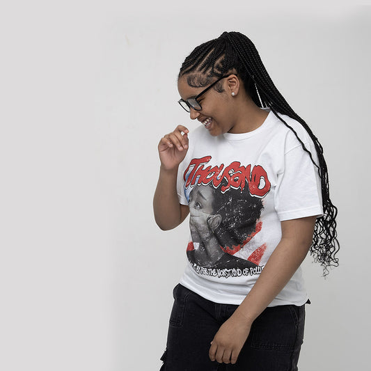 unisex urban street wear brand, overpopulation shirt with American girl close up, side,1THOUSAND,1THOUSAND CLOTHING,